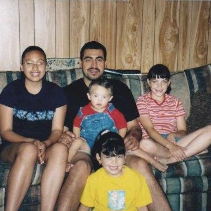 A photo of the Daniel Aviles and his children